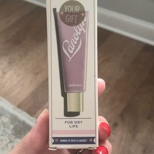 Lanolips rose tinted lip balm.